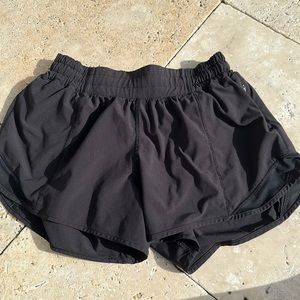 Lululemon low rise 4in hotty hot shorts. Color: Black